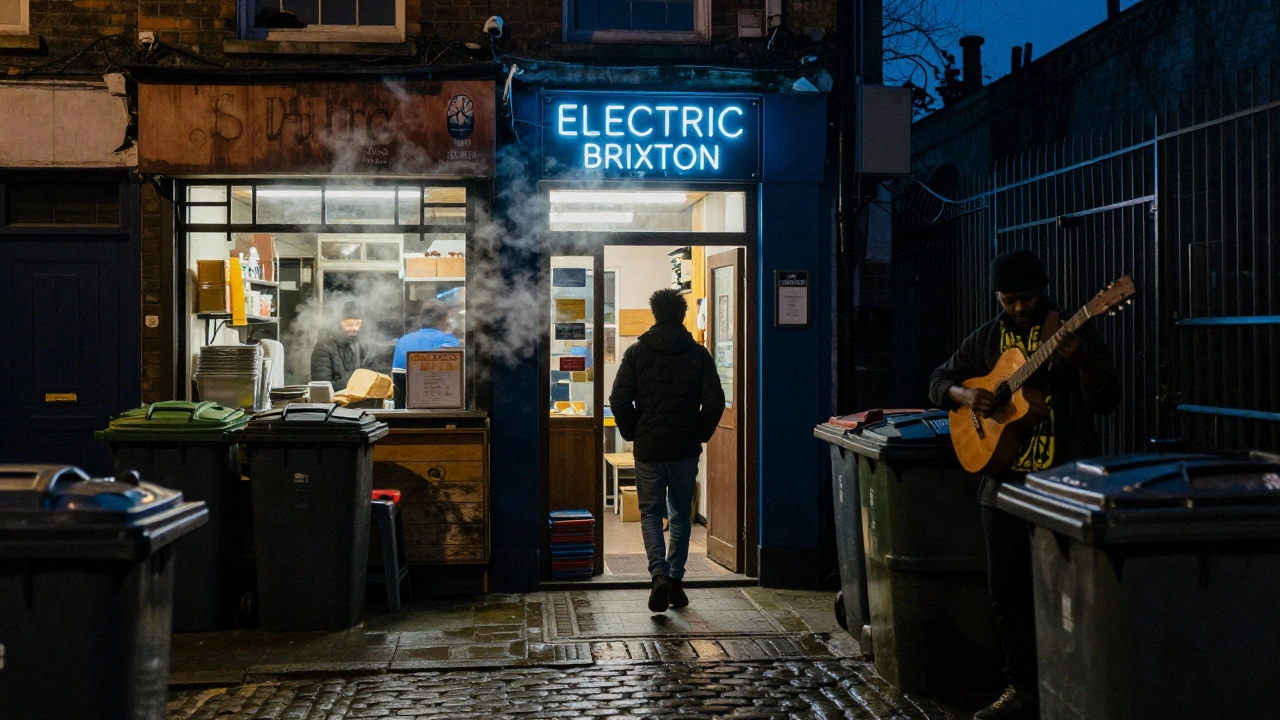 A person entering Electric Brixton through a narrow alley at night, passing a kebab shop and busker under flickering neon.